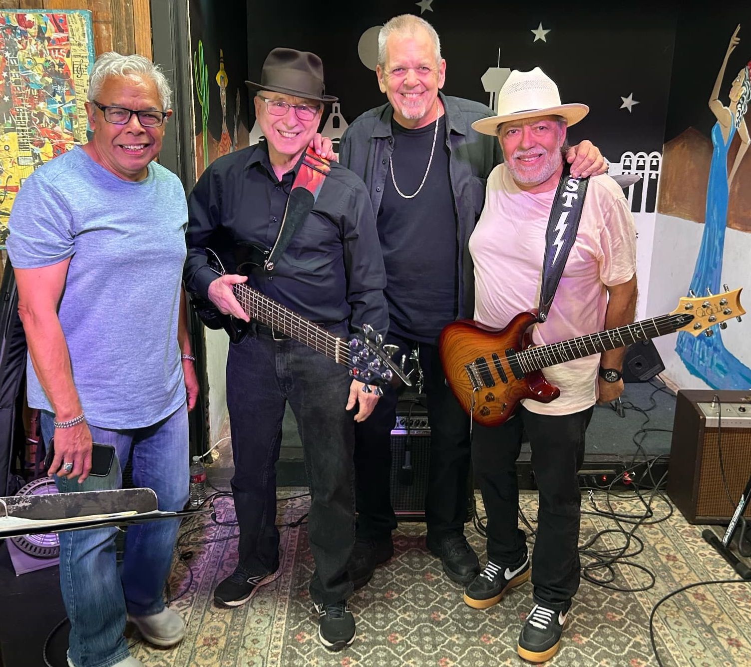 BluJaz, a four-piece blues and jazz band, with their guitars and bass
